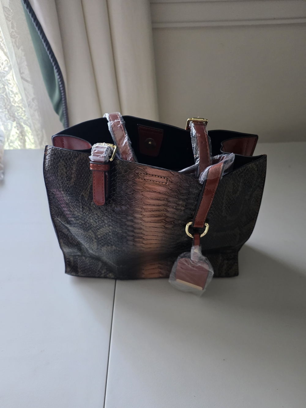 Snake-Embossed Shoulder Bag in Dark Brown with Red Accents